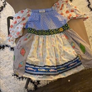 Child’s colorful Matilda Jane top.